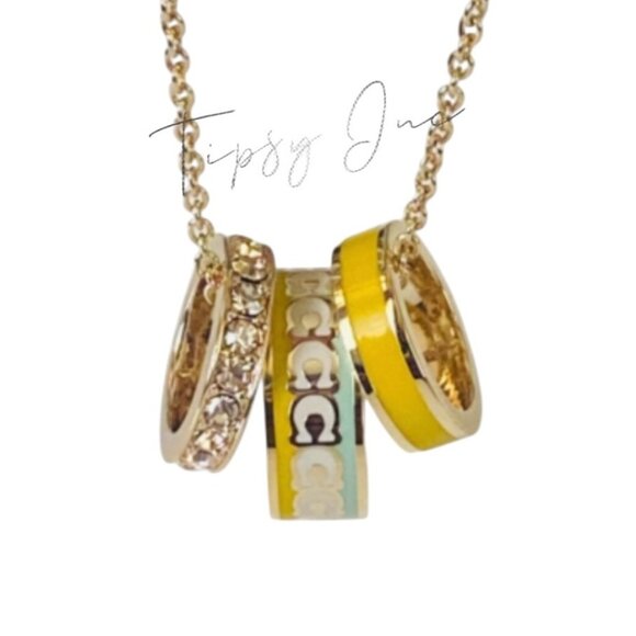 NEW! Coach Gold-Tone Multi-Ring Pendant Necklace With Logo & Crystal Accents - Picture 4 of 7